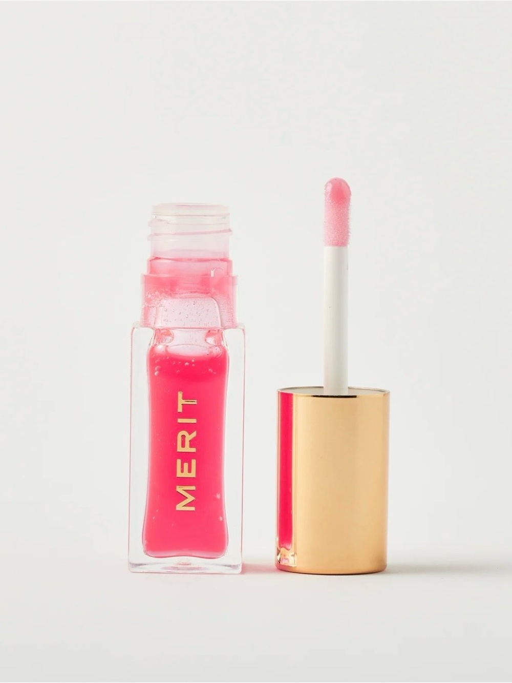 Merit Lip Gloss — Sheer Bright Pink Hydrating Shine